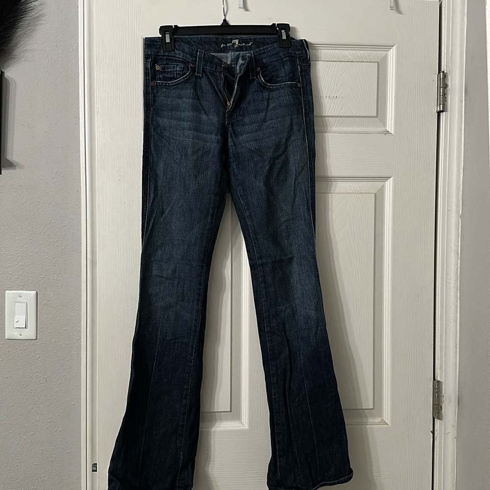7 for All Man Kind. Slight wear at the bottom but great overall condition 27x36